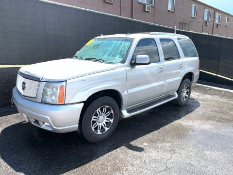 2004 Cadillac Escalade for sale at McManus Motors in Wheat Ridge CO