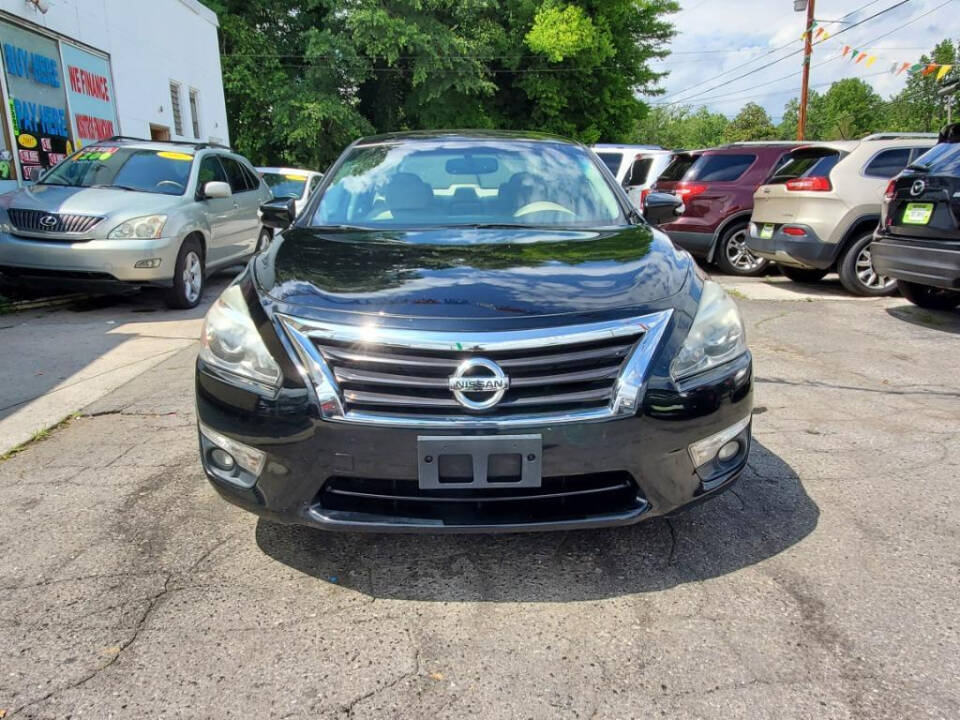 2015 Nissan Altima for sale at DAGO'S AUTO SALES LLC in Dalton, GA