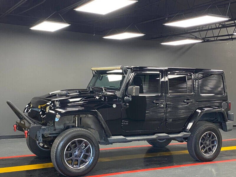 2011 Jeep Wrangler Unlimited for sale at AutoNet of Dallas in Dallas TX