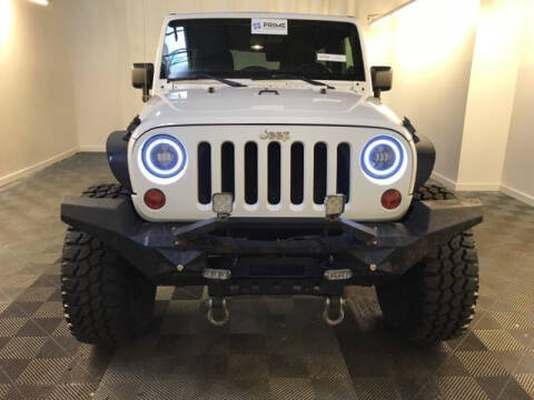 2011 Jeep Wrangler Unlimited for sale at Icon Auto Group in Lake Odessa MI