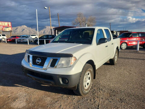 2013 Nissan Frontier for sale at Bickham Used Cars in Alamogordo NM