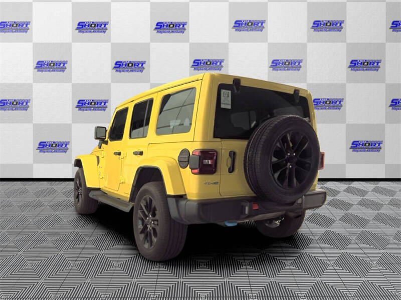 Used 2022 Jeep Wrangler Unlimited Sahara 4XE with VIN 1C4JJXP63NW220967 for sale in Maysville, KY