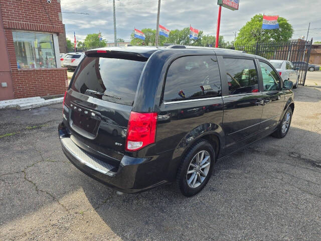 2014 Dodge Grand Caravan for sale at TMY AUTO in Detroit, MI