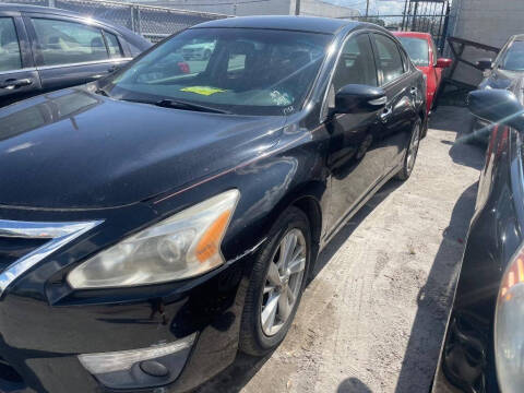 2014 Nissan Altima for sale at STEECO MOTORS in Tampa FL
