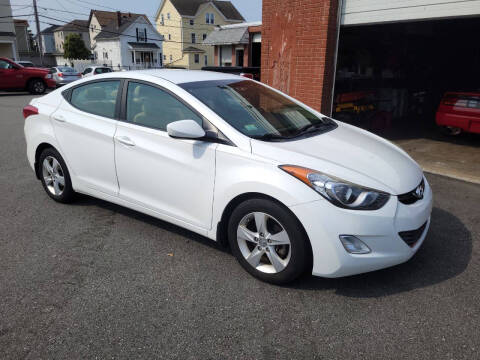 2013 Hyundai Elantra for sale at A J Auto Sales in Fall River MA