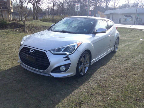 2015 Hyundai Veloster for sale at Triangle Auto Sales in Elgin IL