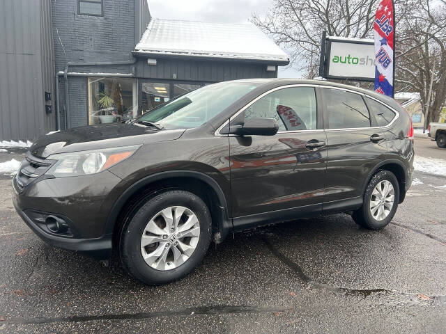 2014 Honda CR-V for sale at Auto Shop in Wyoming, MI