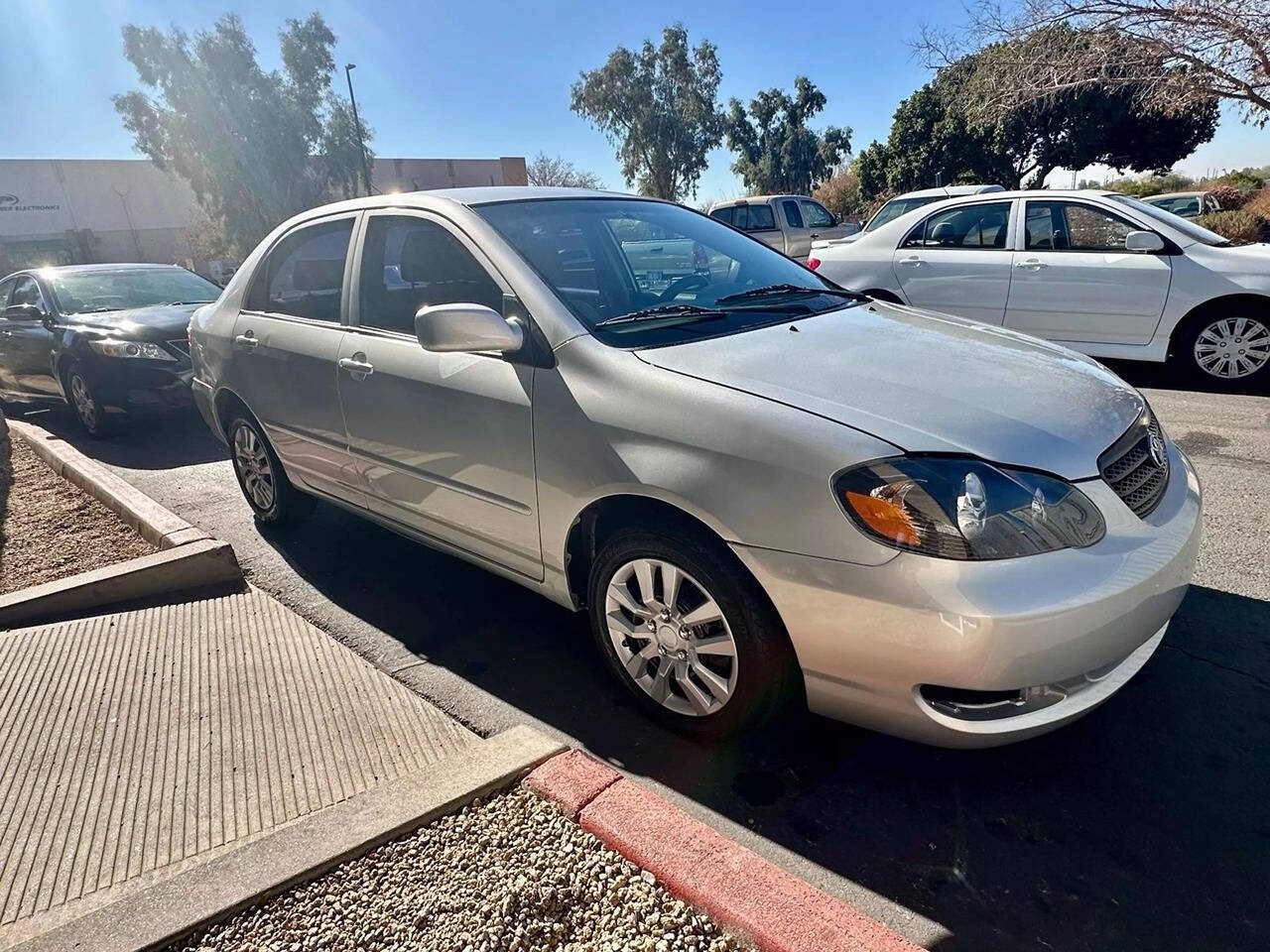 2003 Toyota Corolla for sale at HUDSONS AUTOS in Gilbert, AZ