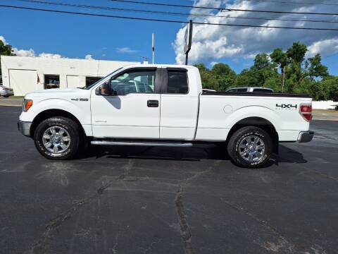 2012 Ford F-150 for sale at G AND J MOTORS in Elkin NC