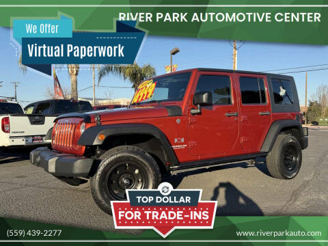 2009 Jeep Wrangler Unlimited for sale at River Park Automotive Center in Fresno CA