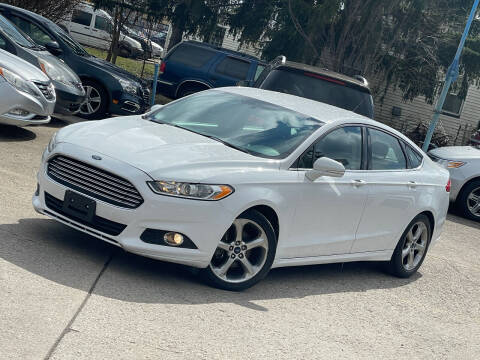 2015 Ford Fusion for sale at Exclusive Auto Group in Cleveland OH