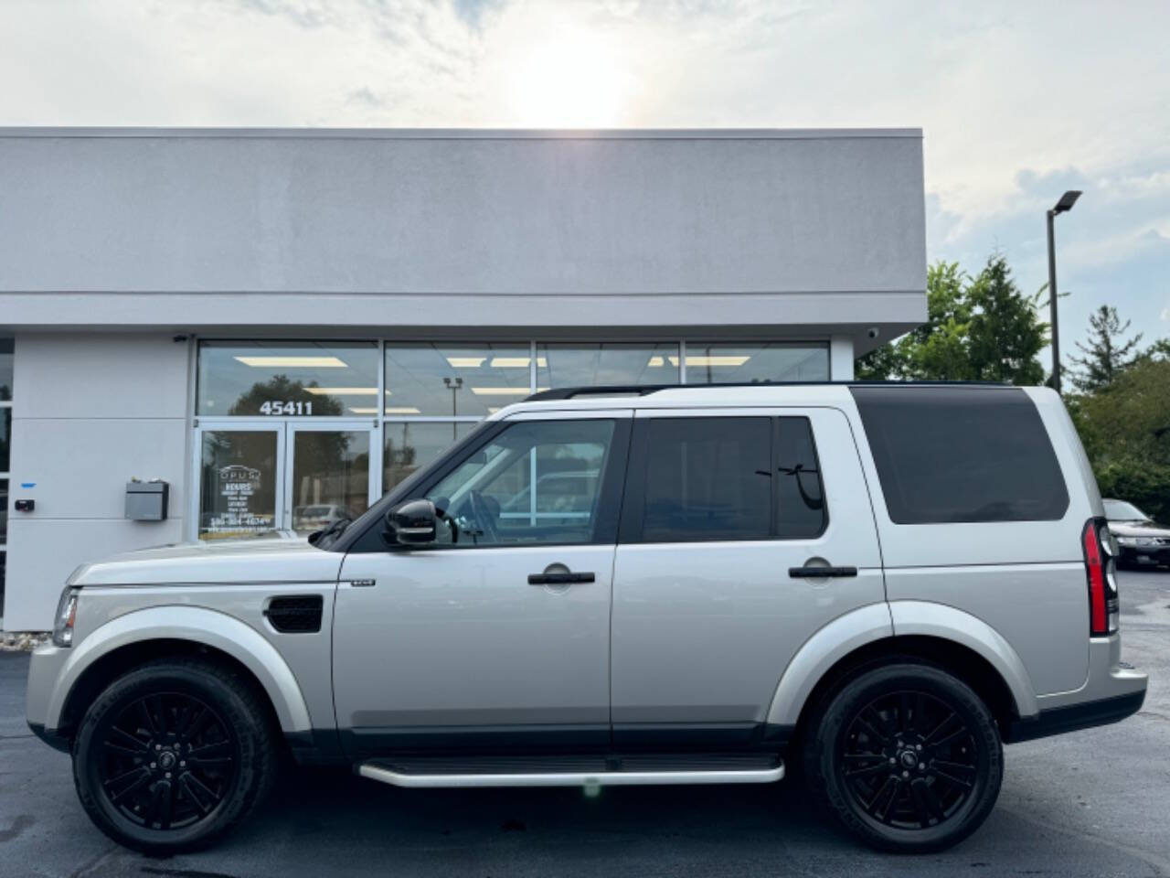 2015 Land Rover LR4 for sale at Opus Motorcars in Utica, MI