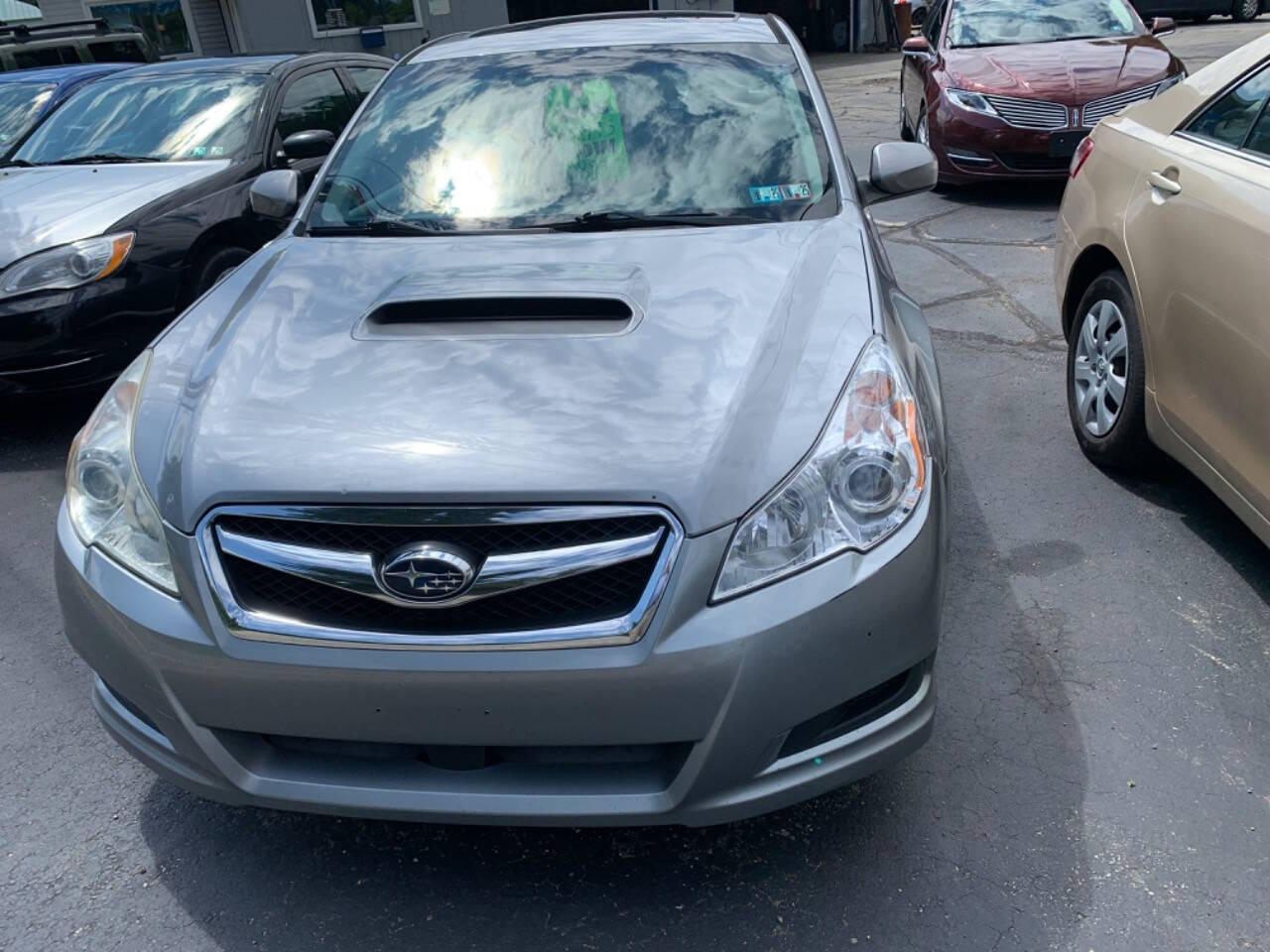 2010 Subaru Legacy for sale at Chuckie Bizzarro's Fleetwing Auto in Erie, PA