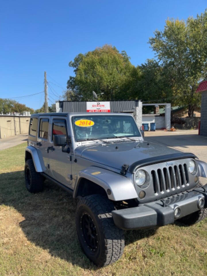 2014 Jeep Wrangler Unlimited for sale at Dixon Auto Sales in Pea Ridge, AR