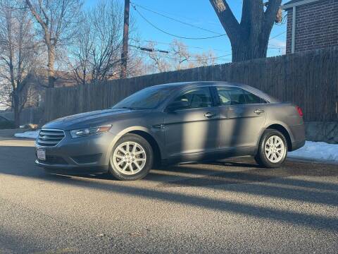 2014 Ford Taurus for sale at Friends Auto Sales in Denver CO
