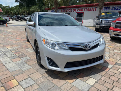 2014 Toyota Camry for sale at Affordable Auto Motors in Jacksonville FL