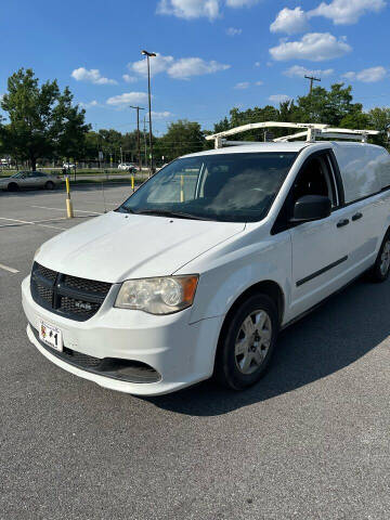 2014 Dodge Grand Caravan for sale at Royal Motors in Hyattsville MD