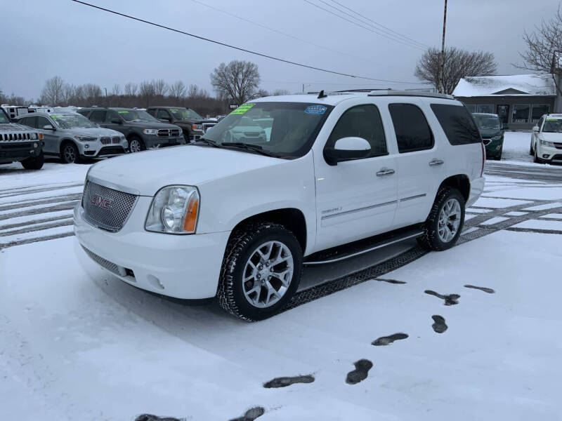 Used 2011 GMC Yukon Denali with VIN 1GKS2EEF9BR353790 for sale in Traverse City, MI