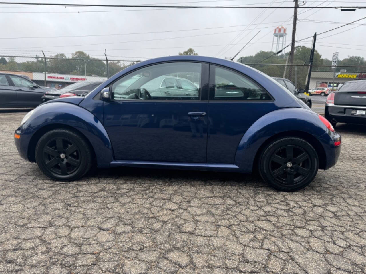 2006 Volkswagen New Beetle for sale at ICars Motors LLC in Gainesville, GA