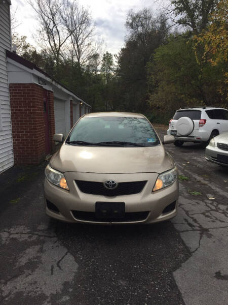 2009 Toyota Corolla for sale at CAR FACTORY OF CLARENCE in Clarence NY