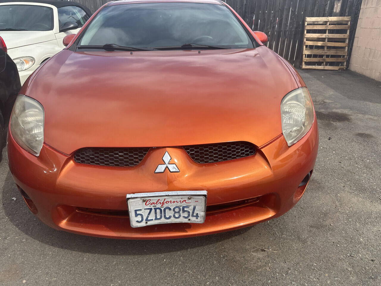 Orange 2007 Mitsubishi Eclipse GS GS 2dr Hatchback (2.4L I4 4A) 1