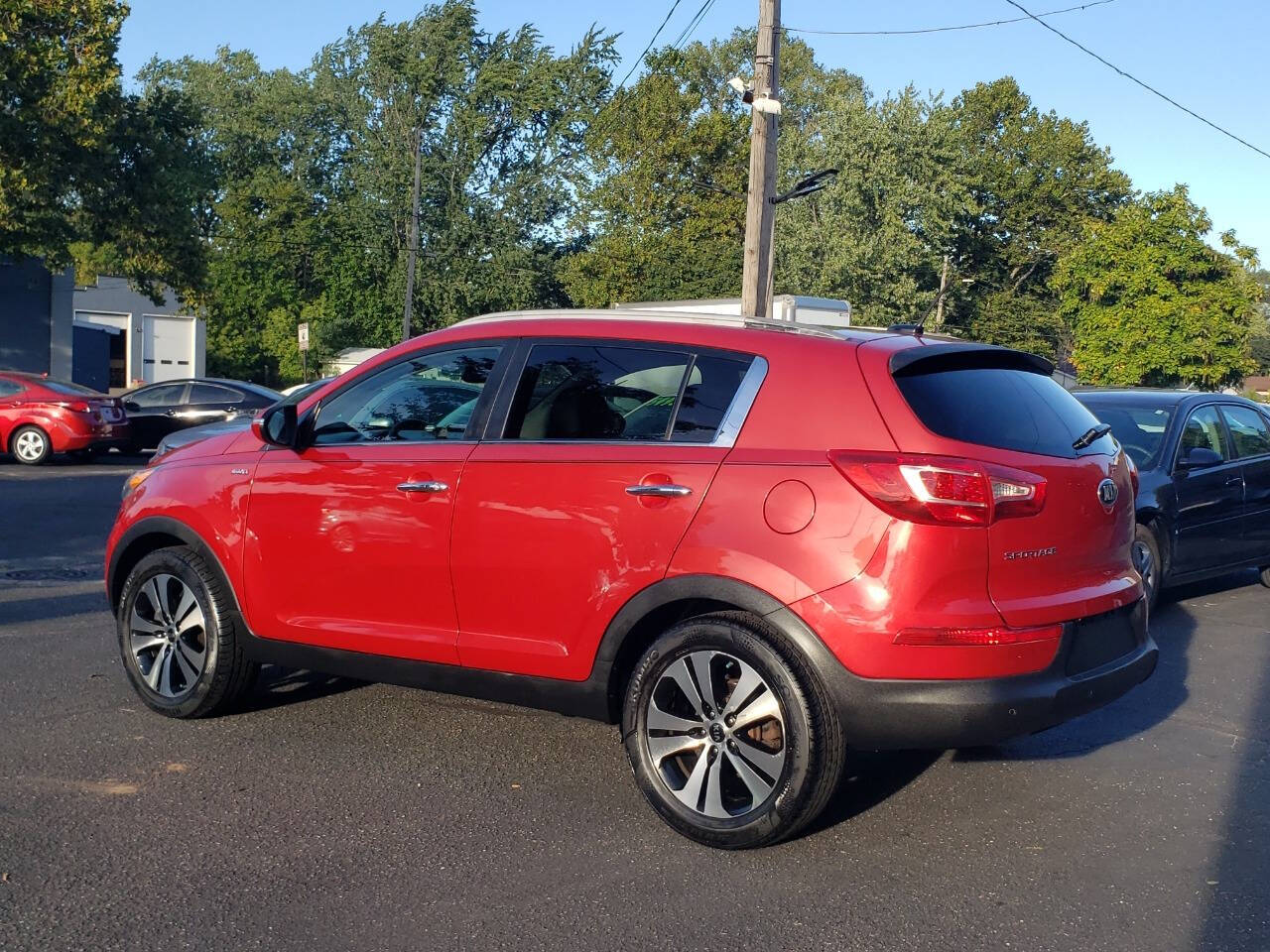 2013 Kia Sportage for sale at Auto Shop in Wyoming, MI