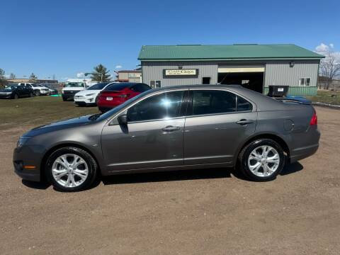 2012 Ford Fusion for sale at Car Guys Autos in Tea SD
