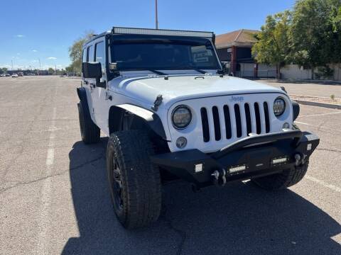 2014 Jeep Wrangler Unlimited for sale at Rollit Motors in Mesa AZ