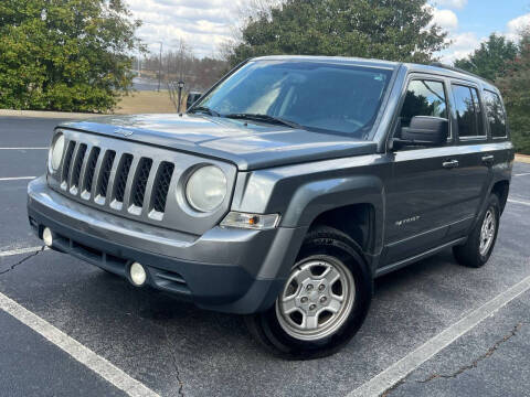 2014 Jeep Patriot for sale at FALCONS AUTOMOTIVE LLC in Buford GA