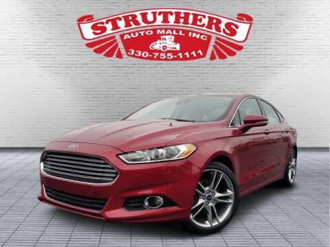 2014 Ford Fusion for sale at STRUTHERS AUTO MALL in Austintown OH