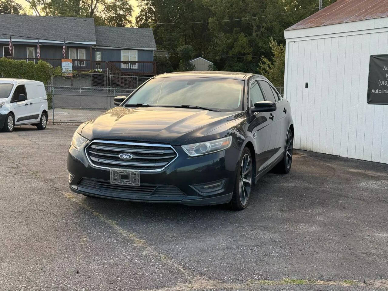 2014 Ford Taurus for sale at Autolink in Kansas City, KS