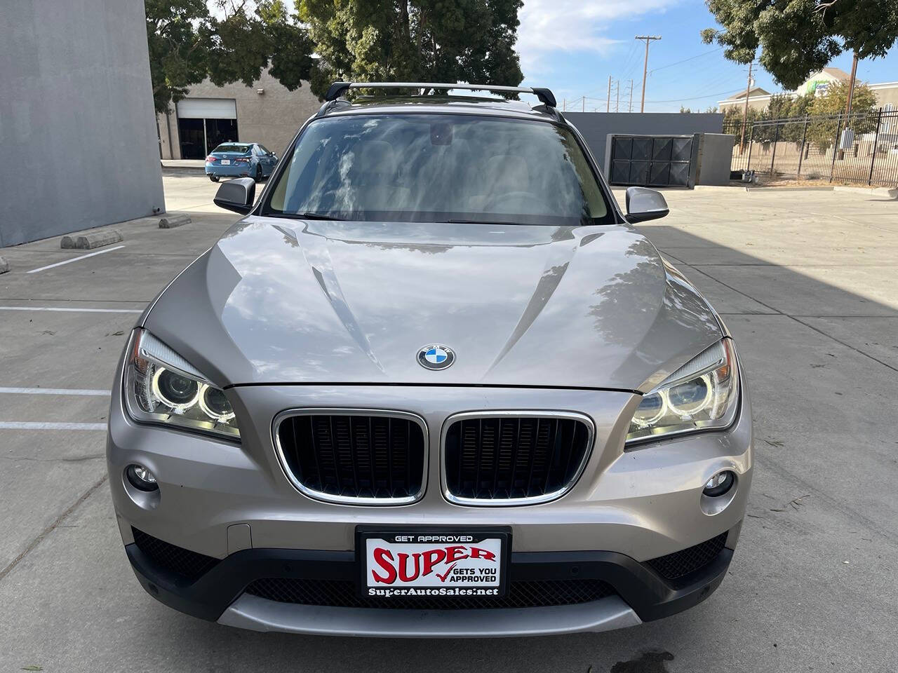 2014 BMW X1 for sale at Super Auto Sales Modesto in Modesto, CA