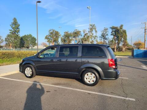 2011 Dodge Grand Caravan for sale at E and M Auto Sales in Bloomington CA