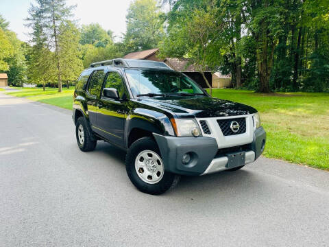 2011 Nissan Xterra for sale at Olympia Motor Car Company in Troy NY