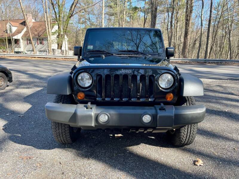 2011 Jeep Wrangler Unlimited for sale at MCQ SALES INC in Upton MA