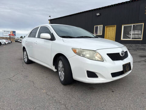 2009 Toyota Corolla for sale at BELOW BOOK AUTO SALES in Idaho Falls ID