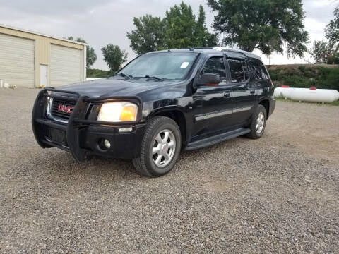 2004 GMC Envoy XUV for sale at KHAN'S AUTO LLC in Worland WY