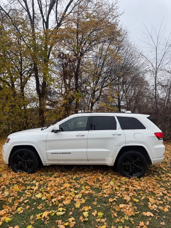 2014 Jeep Grand Cherokee for sale at H & H AUTO GROUP in Detroit, MI