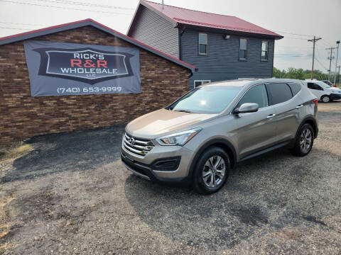 2015 Hyundai Santa Fe Sport for sale at Rick's R & R Wholesale, LLC in Lancaster OH