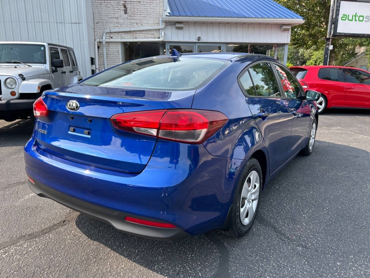 2017 Kia Forte for sale at Auto Shop in Wyoming, MI