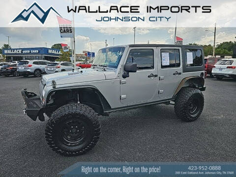 2013 Jeep Wrangler Unlimited for sale at WALLACE IMPORTS OF JOHNSON CITY in Johnson City TN