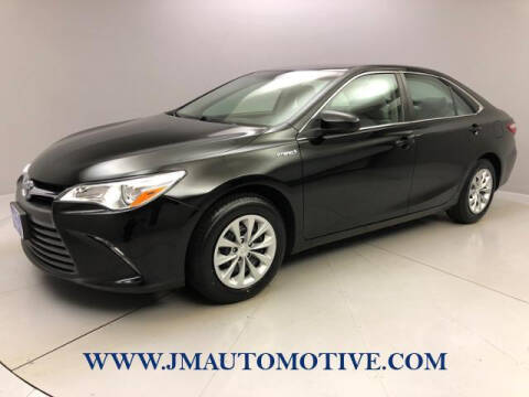 2015 Toyota Camry Hybrid for sale at J & M Automotive in Naugatuck CT