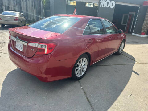 2014 Toyota Camry for sale at Preferable Auto LLC in Houston TX