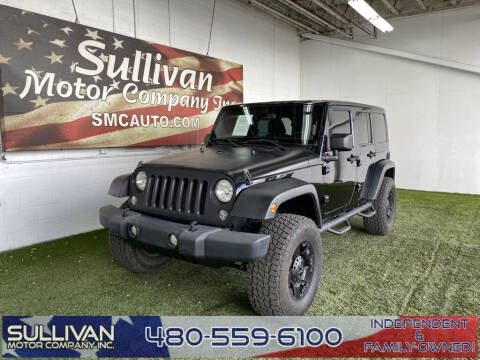 2014 Jeep Wrangler Unlimited for sale at SULLIVAN MOTOR COMPANY INC. in Mesa AZ