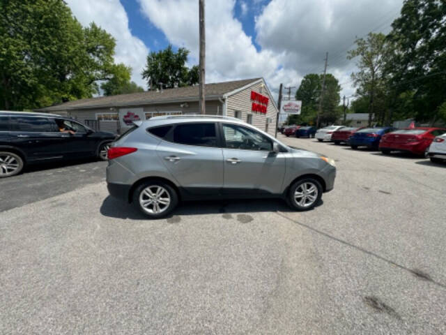 2011 Hyundai TUCSON for sale at Mitrione Motors in Springfield, IL