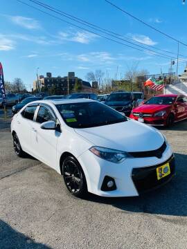 2014 Toyota Corolla for sale at Real Auto Shop Inc. - Webster Auto Sales in Somerville MA