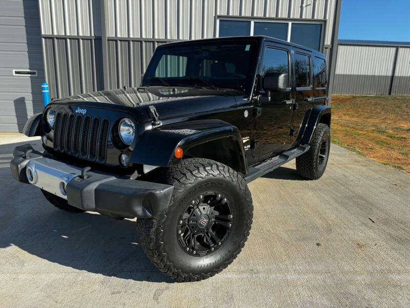 2015 Jeep Wrangler Unlimited for sale at Andover Auto Group, LLC. in Argyle TX