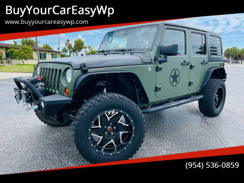 2013 Jeep Wrangler Unlimited for sale at BuyYourCarEasyWp in Fort Myers FL