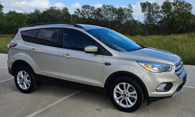 2018 Ford Escape for sale at CAR MARKET AUTO GROUP in Sugar Land, TX