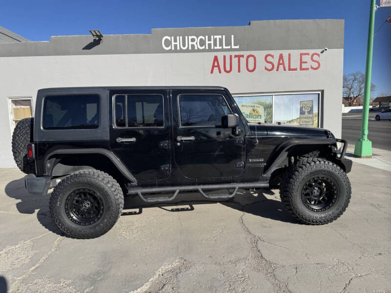 2014 Jeep Wrangler Unlimited for sale at CHURCHILL AUTO SALES in Fallon NV